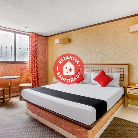 פואבלה Capital O Hotel Valencia מראה חיצוני תמונה