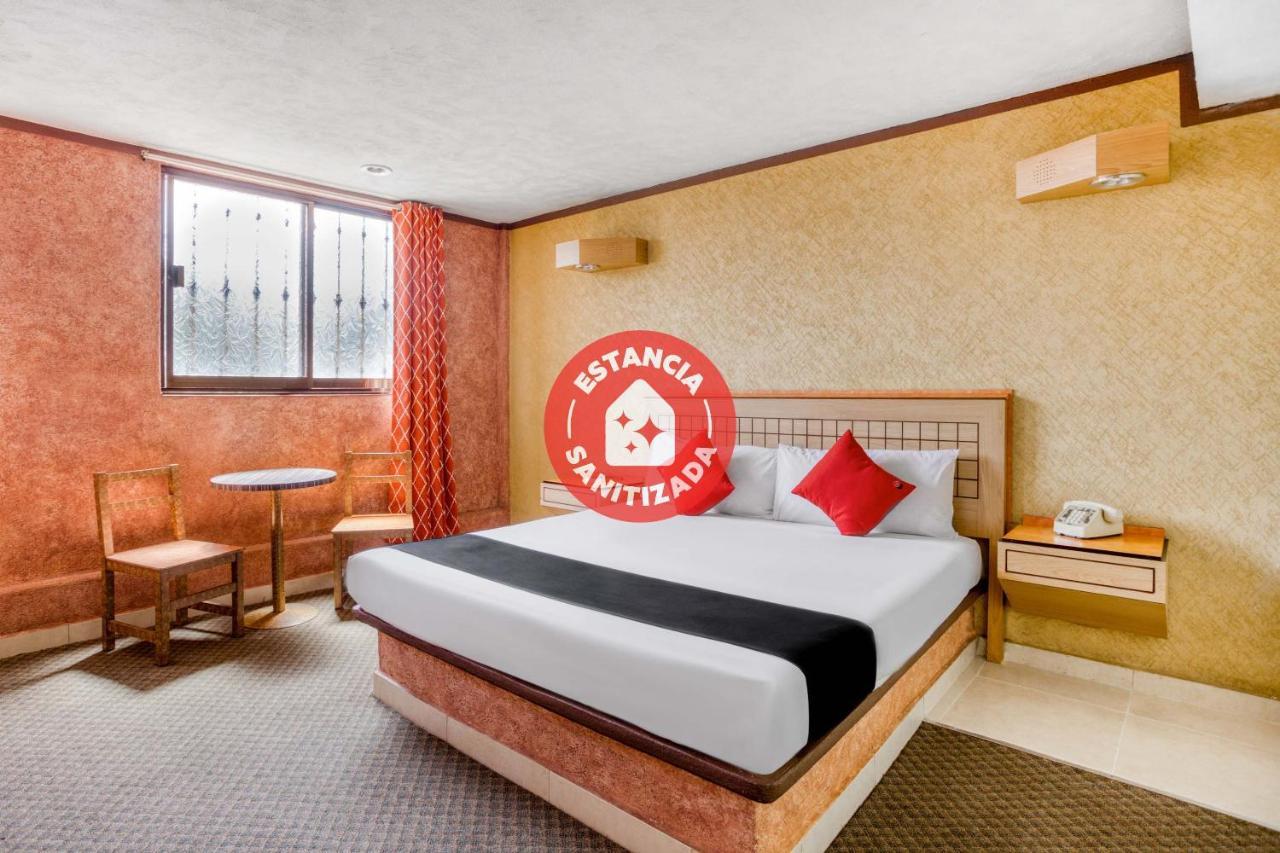 פואבלה Capital O Hotel Valencia מראה חיצוני תמונה