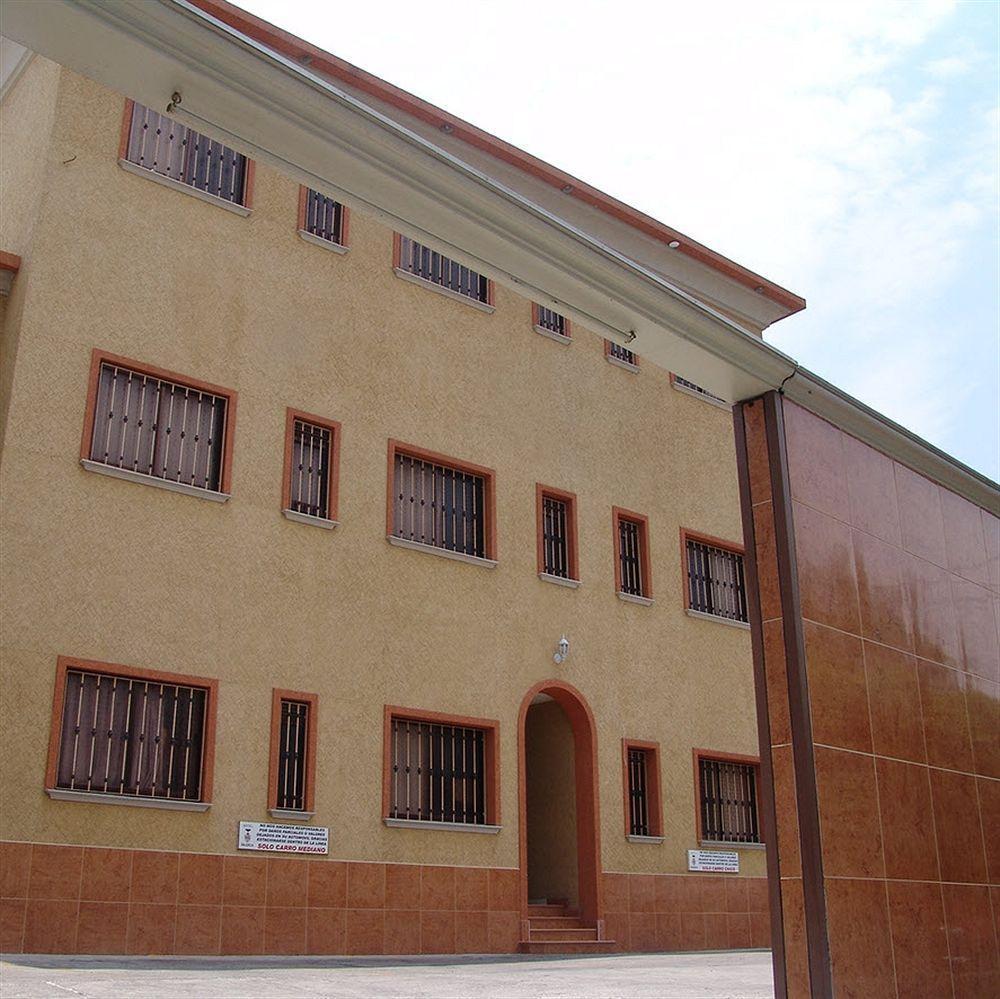 פואבלה Capital O Hotel Valencia מראה חיצוני תמונה