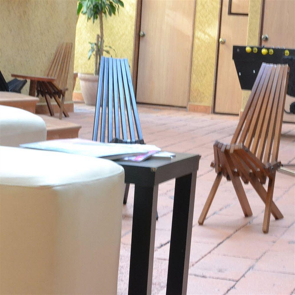 פואבלה Capital O Hotel Valencia מראה חיצוני תמונה