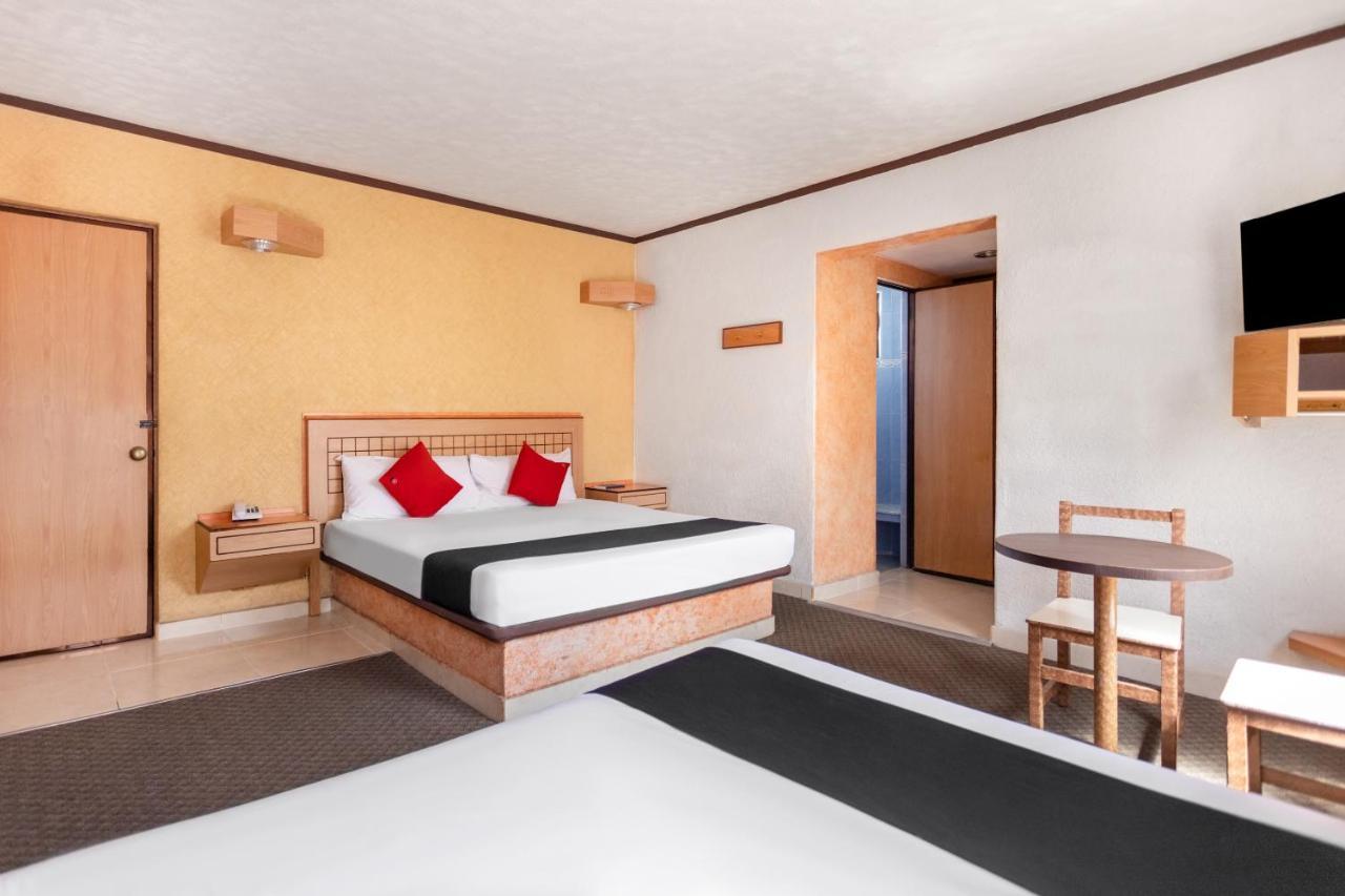 פואבלה Capital O Hotel Valencia מראה חיצוני תמונה