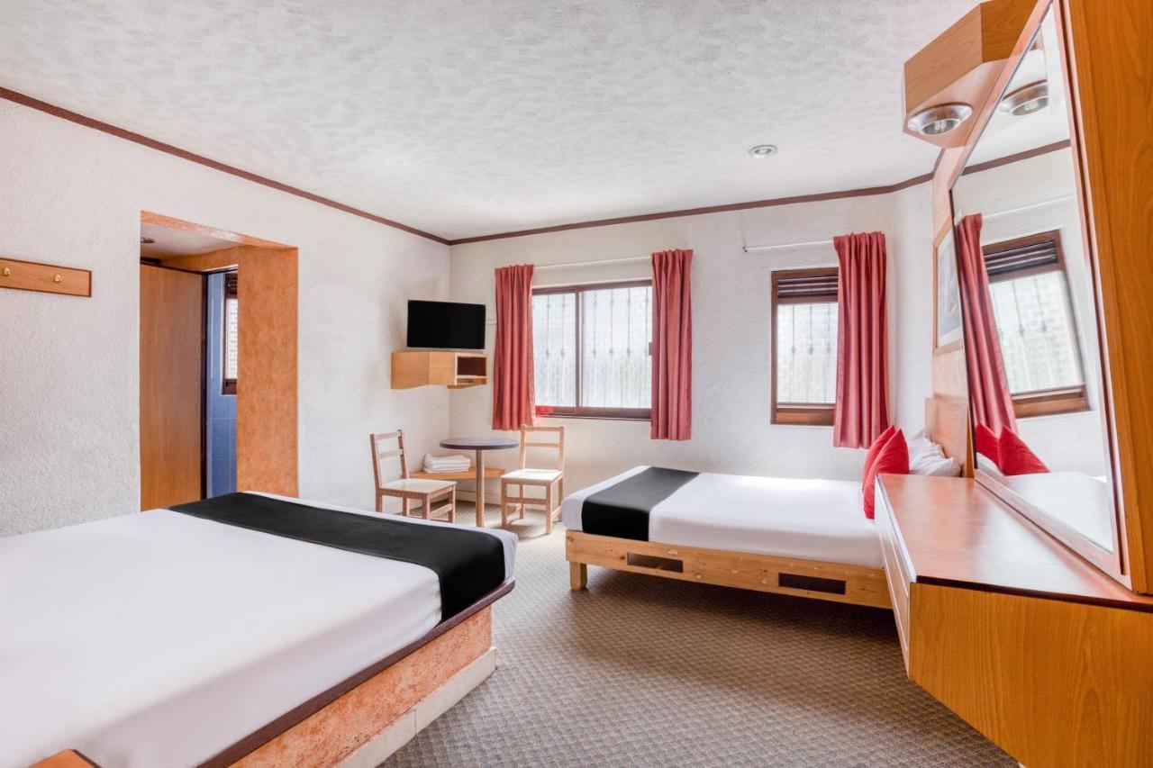 פואבלה Capital O Hotel Valencia מראה חיצוני תמונה