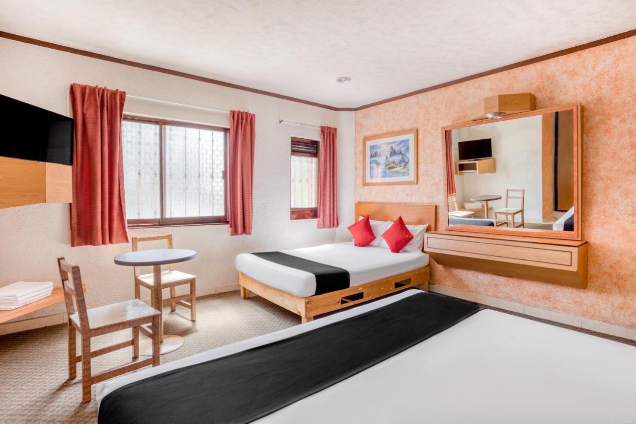 פואבלה Capital O Hotel Valencia מראה חיצוני תמונה