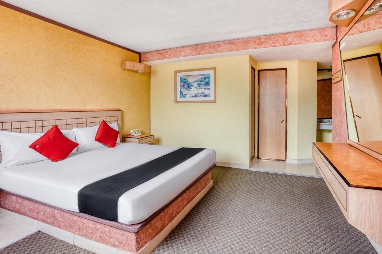 פואבלה Capital O Hotel Valencia מראה חיצוני תמונה