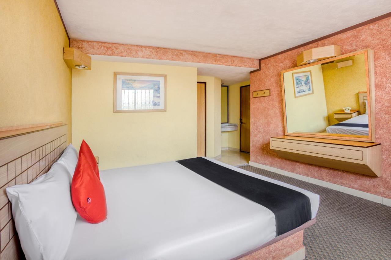 פואבלה Capital O Hotel Valencia מראה חיצוני תמונה