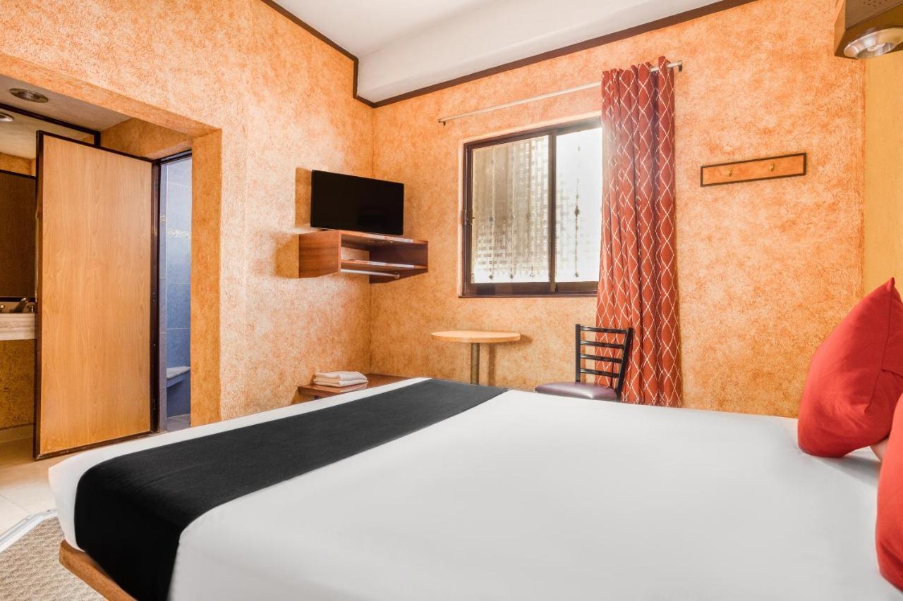 פואבלה Capital O Hotel Valencia מראה חיצוני תמונה
