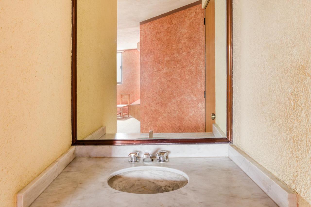 פואבלה Capital O Hotel Valencia מראה חיצוני תמונה